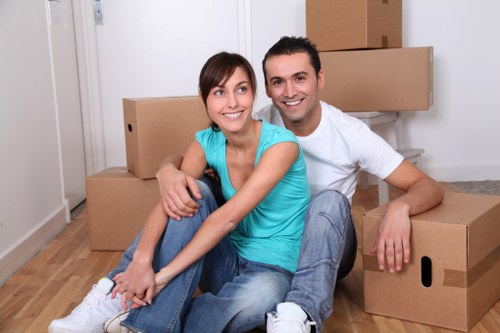 Packed boxes and furniture ready for removals in Parsonsgreen